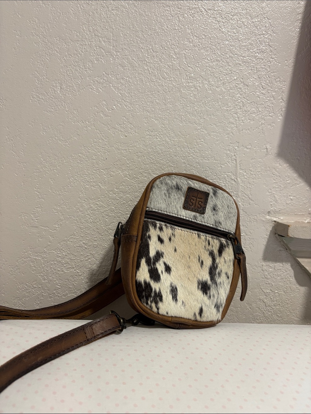 STS Ranchwear Brown Leather Crossbody with Black & White Haircalf Panel